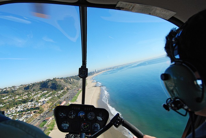 cockpit view of helicopter flight along la coastline toward santa monica