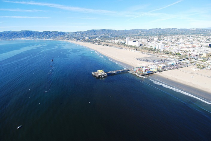 helicopter tours la coastline and looking north to view of pier